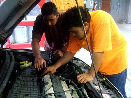 AWD Students working on a car